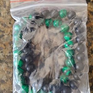 Pair of Green and Black Bracelets